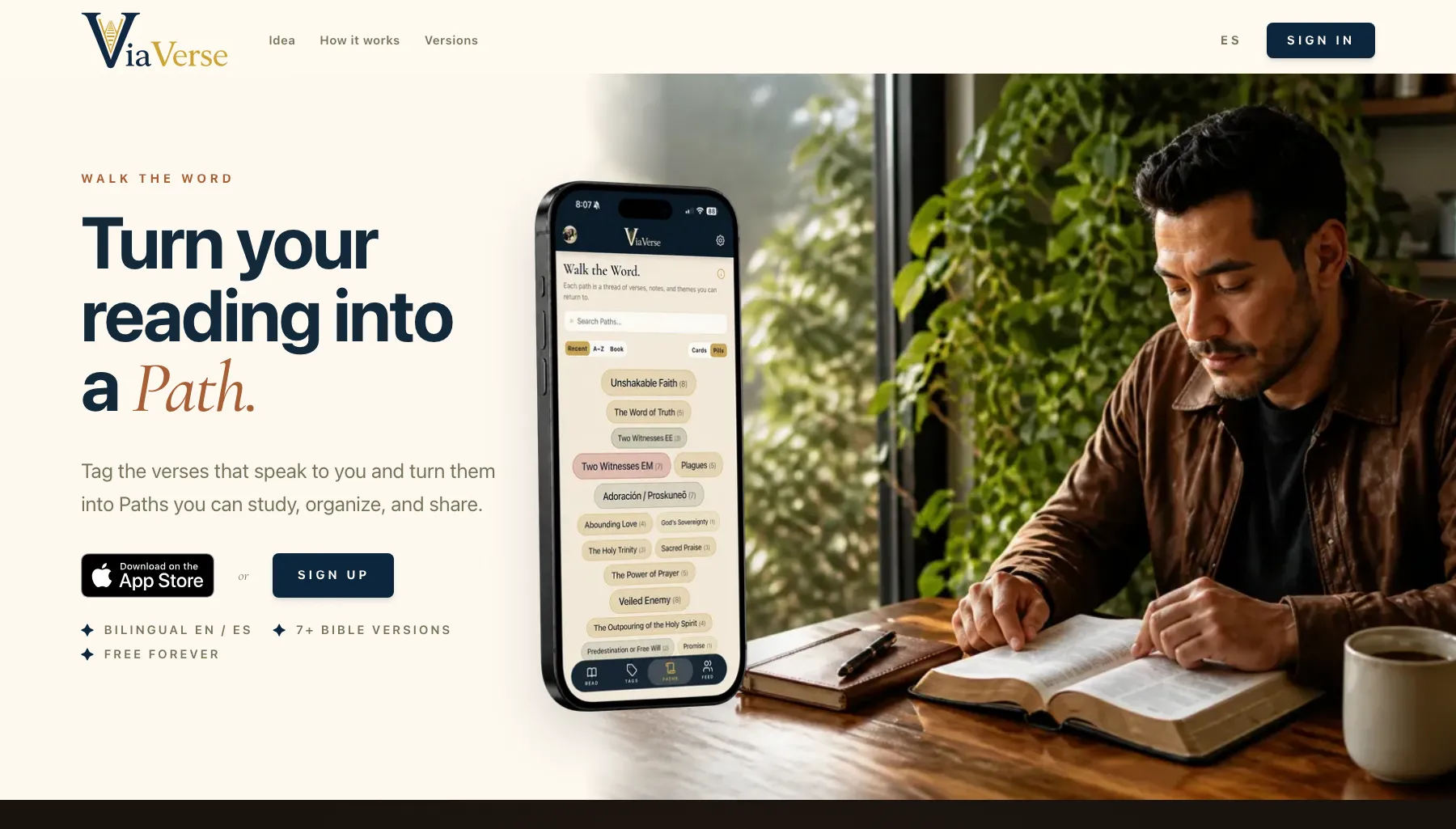 The ViaVerse home page: “Turn your reading into a Path,” beside a phone showing the app and a man reading the Bible.